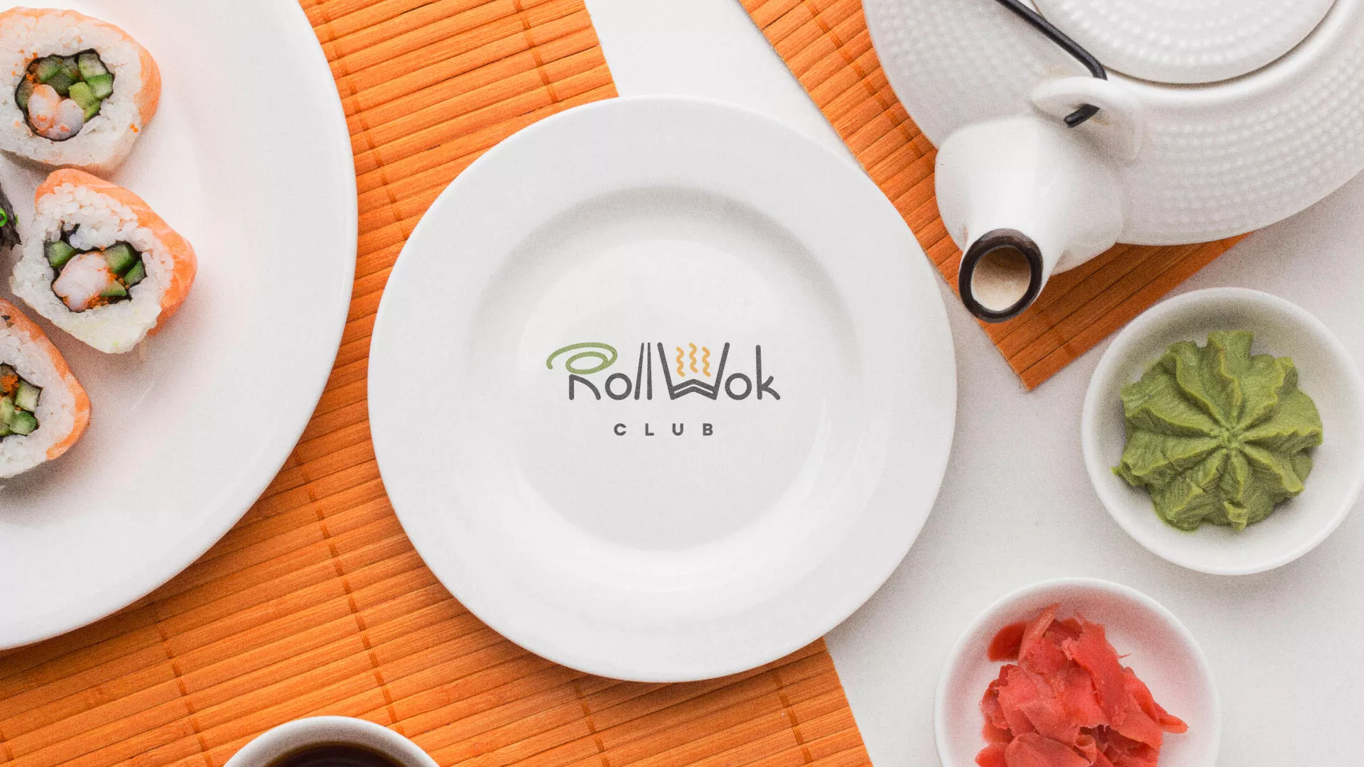 Разработка логотипа и фирменного стиля суши-бара «Roll Wok Club» в Охе